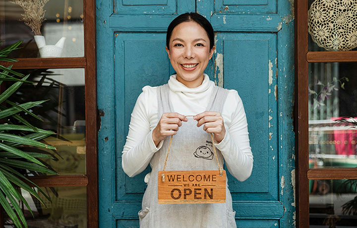 Smiling business owner in a restaurant